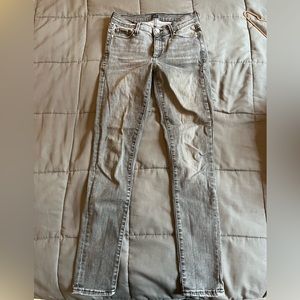 Low-rise skinny jeans light gray